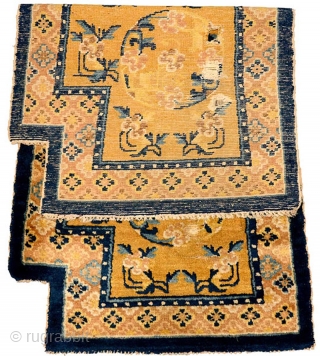 A rare intact set of saddle carpets, i.e.  both for under and above the saddle, made in the Ningxia region of China sometime in the very early 19th century. Although these carpets  ...