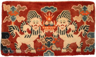 Rare matched pair of Tibetan gabney (or cushions) in original condition as they came out of Tibet circa 1972. (The inner padding under the ribbed blue backing cloth – which was various  ...