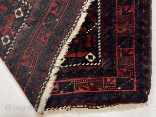 Antique Baluch bagface with an interesting older design. Fine lustrous pile with rich saturated natural color. Nice ember reds and a bit of yellow highlights. Mostly good thick pike with some brown  ...