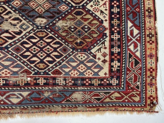  Antique ivory ground Caucasian prayer rug. Probably shirvan with some interesting features including many animals and a well drawn mihrab with hands (although only 4 fingers?). Overall even low pile with  ...