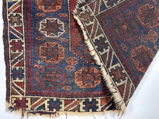 Antique unusually colorful Baluch bagface with an interesting variation of the classic octagon design. Very colorful uncommon border. All natural colors featuring a deep apricot orange and lots of pretty medium blues.  ...