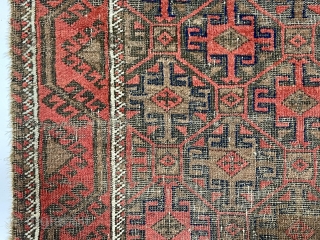 Antique little Baluch with classic tile design field. Interesting meandering vine border. All natural colors. Overall low pile with wear and brown oxidation as shown. Remnant original selvages and kelim ends. I  ...