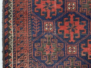 Antique blue ground Baluch rug with an unusual long narrow size, all over tile design and rare piled ends or skirt panels. All natural colors. Overall low pile with considerable oxidized browns.  ...