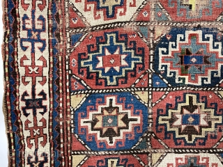 Early colorful moghan Kazak rug with classic memling gul field and nearly square size. Somewhat unusual and spacious ivory border. All good natural colors. As found, scattered areas of wear and a  ...