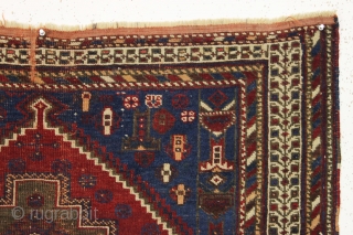 antique diminutive afshar rug. Nice almost square size. Fun border. "as found", dirty with a bit of wear but complete with original fancy selvages and kelim ends. Oxidized browns. Charming little rug.  ...
