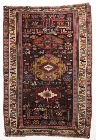 camel trains and sprinting wild horses. Kurd or veramin? Outstanding saturated natural colors. Good pile. Minor repairs. Wild. ca. 1880 or earlier 3'10" x 5'10"        