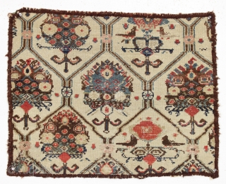 Antique little rug fragment, probably NW Persian. Nice design and pretty colors. Low pile with wear as shown. Yarn wrapped edges. Charming remnant of a great old carpet. 19th c.  23"  ...