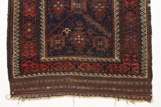 antique early baluch rug. Rare example just found locally. "as found", complete with original kelim ends but very dirty with wear and a good tear as shown. All natural colors. 3rd qtr.  ...