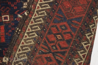 antique early baluch rug. Rare example just found locally. "as found", complete with original kelim ends but very dirty with wear and a good tear as shown. All natural colors. 3rd qtr.  ...