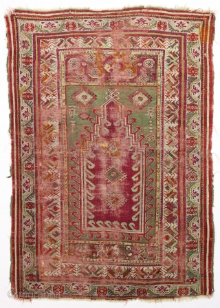 Antique turkish prayer rug. Well used older example with nice drawing and wide range of colors. Beautiful greens. "as found", with heavy wear and some small old repairs. Priced accordingly. 19th c.  ...