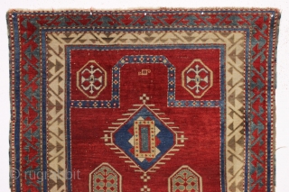 antique bordjalou kazak prayer rug. Iconic design. All natural colors featuring a beautiful red ground, nice old greens and pretty medium blues. Unrestored, near original condition. Slight wear. Could use a bit  ...