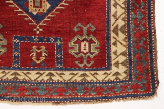 antique bordjalou kazak prayer rug. Iconic design. All natural colors featuring a beautiful red ground, nice old greens and pretty medium blues. Unrestored, near original condition. Slight wear. Could use a bit  ...
