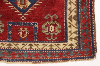 antique bordjalou kazak prayer rug. Iconic design. All natural colors featuring a beautiful red ground, nice old greens and pretty medium blues. Unrestored, near original condition. Slight wear. Could use a bit  ...