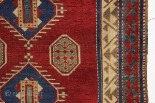 antique bordjalou kazak prayer rug. Iconic design. All natural colors featuring a beautiful red ground, nice old greens and pretty medium blues. Unrestored, near original condition. Slight wear. Could use a bit  ...