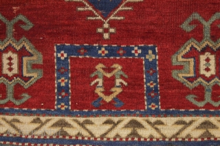 antique bordjalou kazak prayer rug. Iconic design. All natural colors featuring a beautiful red ground, nice old greens and pretty medium blues. Unrestored, near original condition. Slight wear. Could use a bit  ...