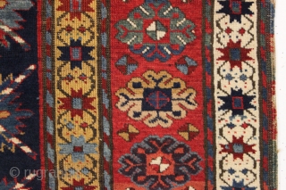 antique kazak or gendge rug with an interesting design and superb natural colors. Very high qualty weaving with beautiful wool. Deep blue ground. Washed but unrestored with mostly good pile, slight scattered  ...