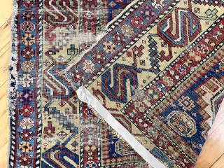 Caucasian long rug with eye catching wide yellow “S” border. Good natural colors. All wool. Not perfect condition with some heavy wear and edge roughness. Attractive older example. ca. 1875 or earrlier.  ...