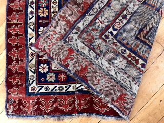 Out of the cedar chests. Early Caucasian long rug. Talish? Great pictorial area. Exceptional borders. Intact but not perfect condition. Edges rough and scattered crude flat stitch repairs. Handkerchief like handle. Early  ...
