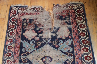 early kuba or seichour long rug with an eye catching border. And yes, I know it is worn. ca. 1850 3'7" x 9'6"          