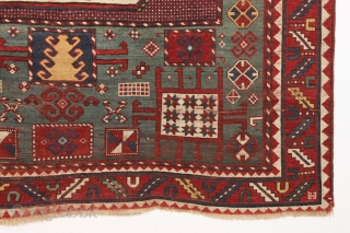 antique karachopf kazak. Untouched, unrestored large classic kazak. All natural colors featuring a beauiful abrashed green field, good reds, multiple blues and a fine old yellow. Pile varies from good thick medium  ...