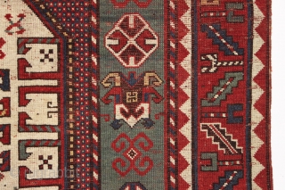 antique karachopf kazak. Untouched, unrestored large classic kazak. All natural colors featuring a beauiful abrashed green field, good reds, multiple blues and a fine old yellow. Pile varies from good thick medium  ...