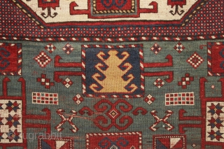 antique karachopf kazak. Untouched, unrestored large classic kazak. All natural colors featuring a beauiful abrashed green field, good reds, multiple blues and a fine old yellow. Pile varies from good thick medium  ...