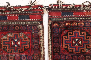 old pair of complete northwest persian or kurdish bags. Interesting design. All good colors. Some wear and heavy brown oxidation. Original backs. late 19th c. each bag app. 25" x 27"   ...