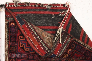 old pair of complete northwest persian or kurdish bags. Interesting design. All good colors. Some wear and heavy brown oxidation. Original backs. late 19th c. each bag app. 25" x 27"   ...