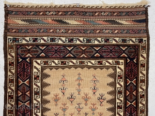 Antique unusual and attractive small Baluch weaving with mixed pile and flat weave techniques. Complex and colorful pile borders and extra fancy end kelims compliment the spacious flat woven field. Pile areas  ...