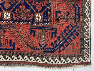 Antique small Baluch rug with a “snowflake” type design and turkman “boat” border. Very good natural color featuring a rich ember red ample white highlights and a deep blue ground. Overall decent  ...