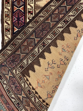 Antique unusual and attractive small Baluch weaving with mixed pile and flat weave techniques. Complex and colorful pile borders and extra fancy end kelims compliment the spacious flat woven field. Pile areas  ...