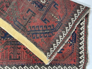 Antique small Baluch rug with a “snowflake” type design and turkman “boat” border. Very good natural color featuring a rich ember red ample white highlights and a deep blue ground. Overall decent  ...