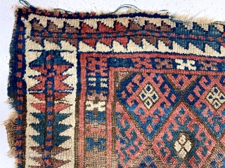 Antique jaf Kurd bagface with some interesting features but in very rough condition. This older example has a somewhat larger scale field and both uncommon main and minor borders. The diamond lattice  ...