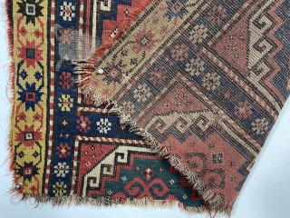 Antique Kazak or Moghan rug fragment. Good age and drawing but overall very rough condition. As found, very very dirty with holes, tears, dirt and who knows what on the surface? Edges  ...