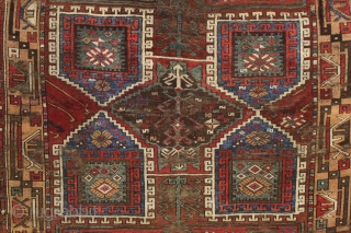 Early turkish village rug. Archaic. Beautiful natural colors. Old piece with scattered small repairs of varying quality. First half 19th c. 5'1" x 7'3"         