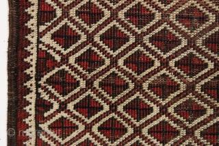 Antique tiny Baluch rug with an unusual allover design. All natural colors. "as found", with some wear as shown but original sides and ends. Reasonably clean with a small old stain as  ...