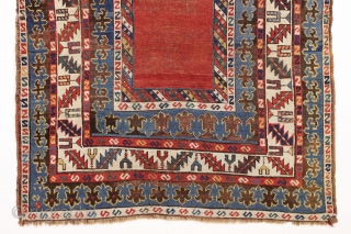 antique large kazak rug with eye catching borders and nearly empty field. All natural colors including a beautiful old purple. Some wear and heavy brown oxidation as shown but mostly decent pile  ...
