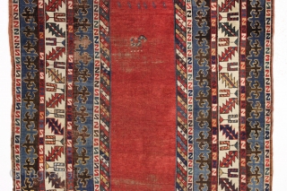 antique large kazak rug with eye catching borders and nearly empty field. All natural colors including a beautiful old purple. Some wear and heavy brown oxidation as shown but mostly decent pile  ...