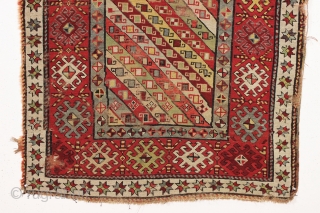 antique caucasian long rug, probably talish. Nice design with good colors featuring rich greens, multiple reds, light blues, and a deep purple. "as found", with wear, heavy black oxidation and some damage  ...