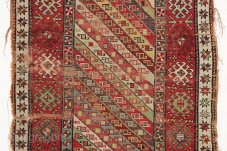 antique caucasian long rug, probably talish. Nice design with good colors featuring rich greens, multiple reds, light blues, and a deep purple. "as found", with wear, heavy black oxidation and some damage  ...