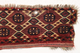 antique turkoman fragment. A high quality ersari beshir jollar or torba with an ikat inspired design. Mostly good pile. All natural colors. Good age, ca. 1875 or earlier. 13" x 53"  