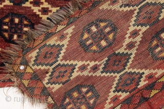antique turkoman fragment. A high quality ersari beshir jollar or torba with an ikat inspired design. Mostly good pile. All natural colors. Good age, ca. 1875 or earlier. 13" x 53"  