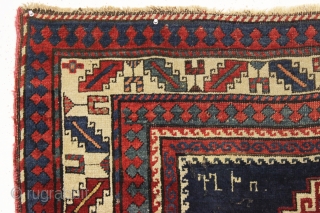 antique kazak or gendge rug with interesting inscriptions. Good thick medium length pile. All natural colors. "As found", very very dirty and with old moth nibbles (dinners) in the deep blue ground.  ...