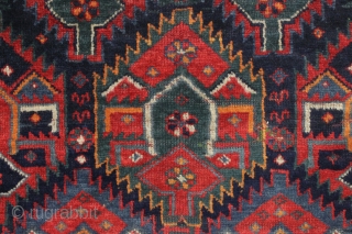 antique kurdish "flaming" palmette rug fragment. Spectacular natural colors and thick glossy wool. As found recently with a little wear, few creases, and inexplicably reduced in length at bottom. Priced accordingly. Could  ...