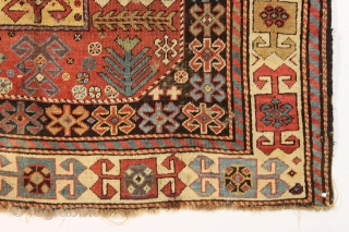 antique caucasian long rug, probably akstafa, with an interesting design featuring bold chajli type medallions. As found, with good fine weave and allover low pile, heavy brown oxidation, a few crude patch  ...