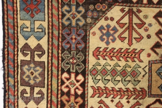 antique caucasian long rug, probably akstafa, with an interesting design featuring bold chajli type medallions. As found, with good fine weave and allover low pile, heavy brown oxidation, a few crude patch  ...