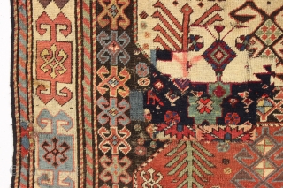 antique caucasian long rug, probably akstafa, with an interesting design featuring bold chajli type medallions. As found, with good fine weave and allover low pile, heavy brown oxidation, a few crude patch  ...