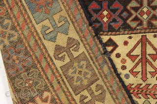 antique caucasian long rug, probably akstafa, with an interesting design featuring bold chajli type medallions. As found, with good fine weave and allover low pile, heavy brown oxidation, a few crude patch  ...