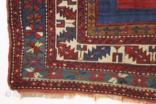 antique kazak rug with an eye catching empty field. Mostly good pile. As found, a bit dirty with scattered slight wear, few very small holes and creases as shown. Original selvages and  ...