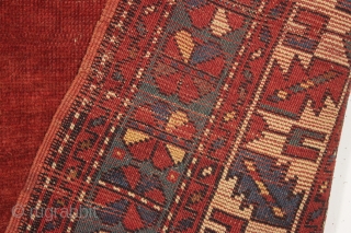 antique kazak rug with an eye catching empty field. Mostly good pile. As found, a bit dirty with scattered slight wear, few very small holes and creases as shown. Original selvages and  ...